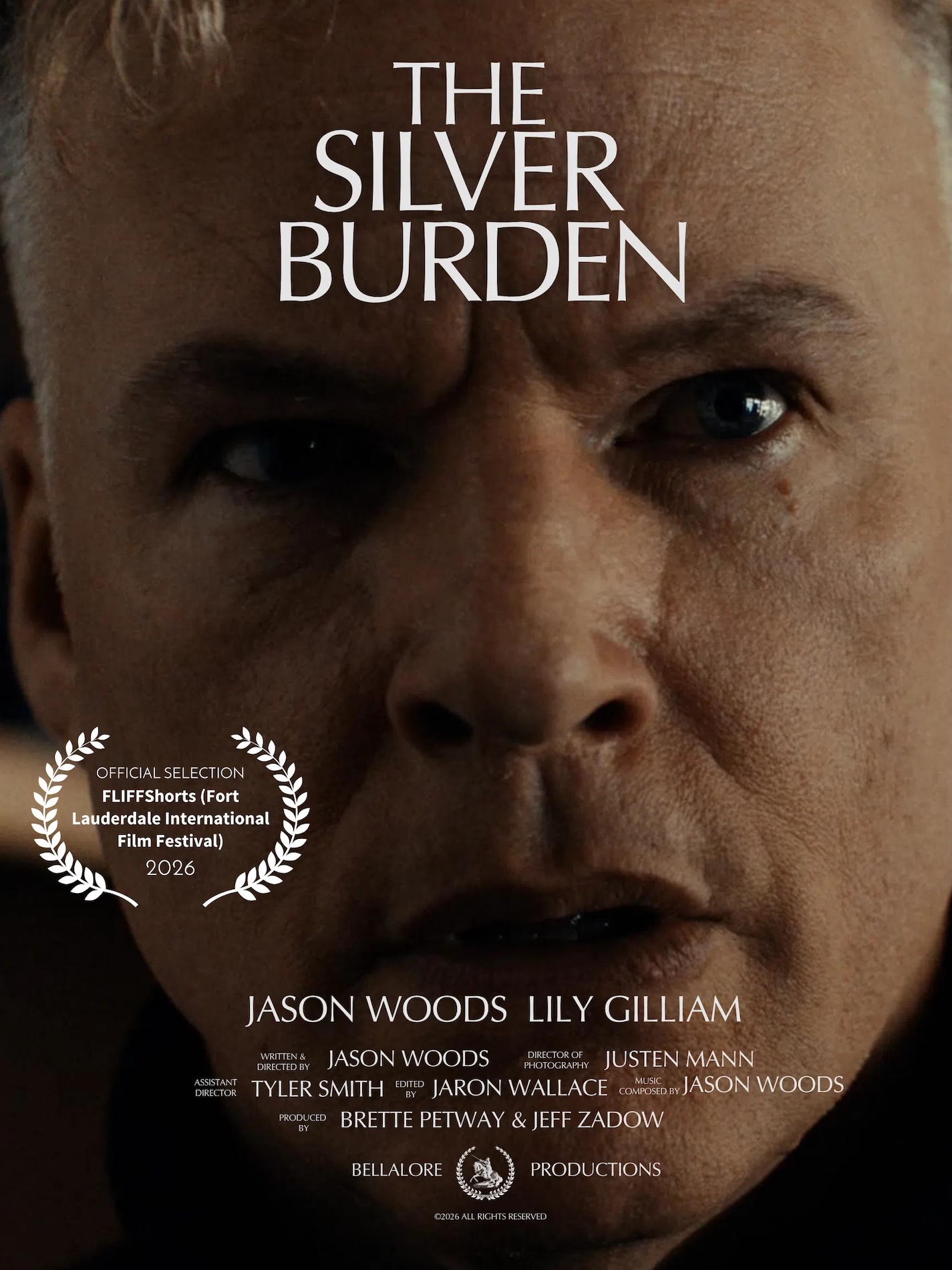 Film poster for The Silver Burden featuring a close-up of a mans face, the 2026 Fort Lauderdale International Film Festival official selection laurel, and the films cast and crew credits.