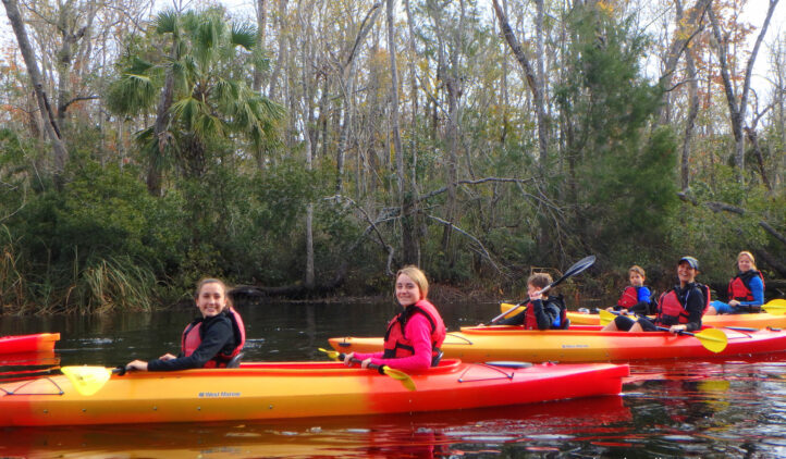 Family kayaking on Amelia Island