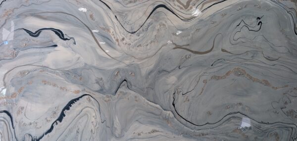 Abstract painting with swirling patterns in shades of gray, white, black, and hints of copper. The lines and colors blend and flow in a marbled effect, creating a fluid, dynamic texture across the canvas.