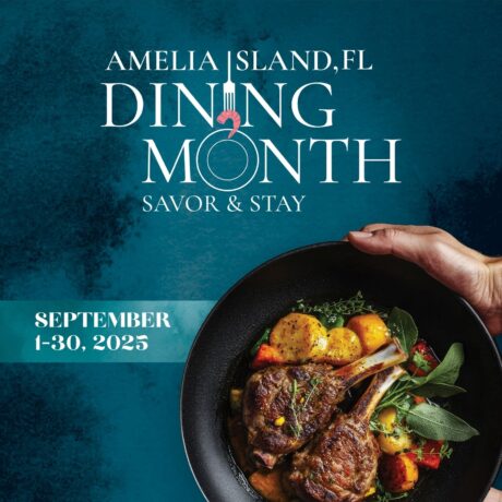 A hand holds a black bowl filled with cooked lamb chops, potatoes, and vegetables. Text above reads Amelia Island, FL Dining Month, Savor & Stay, with dates September 1-30, 2025 on a teal banner.