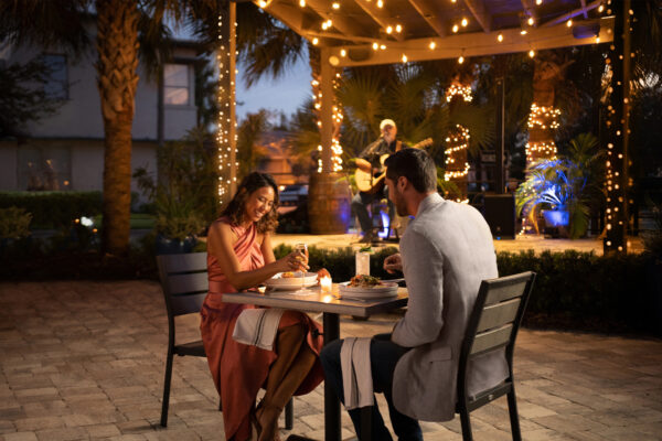 couple dining outdoors at night