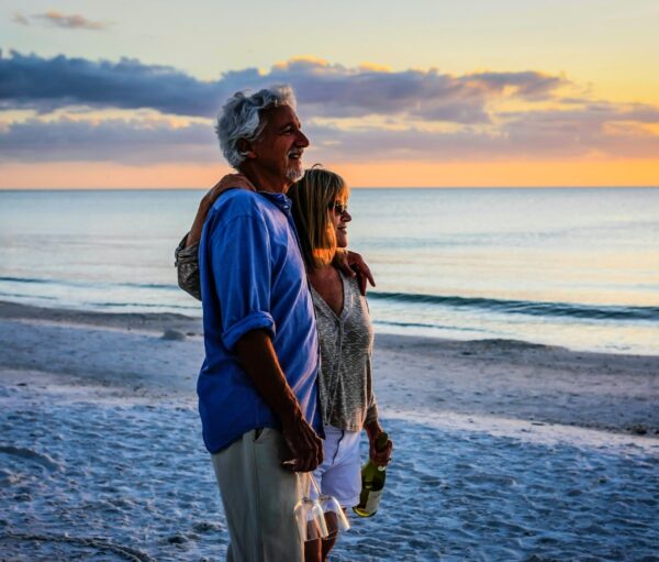 couple standing on sand