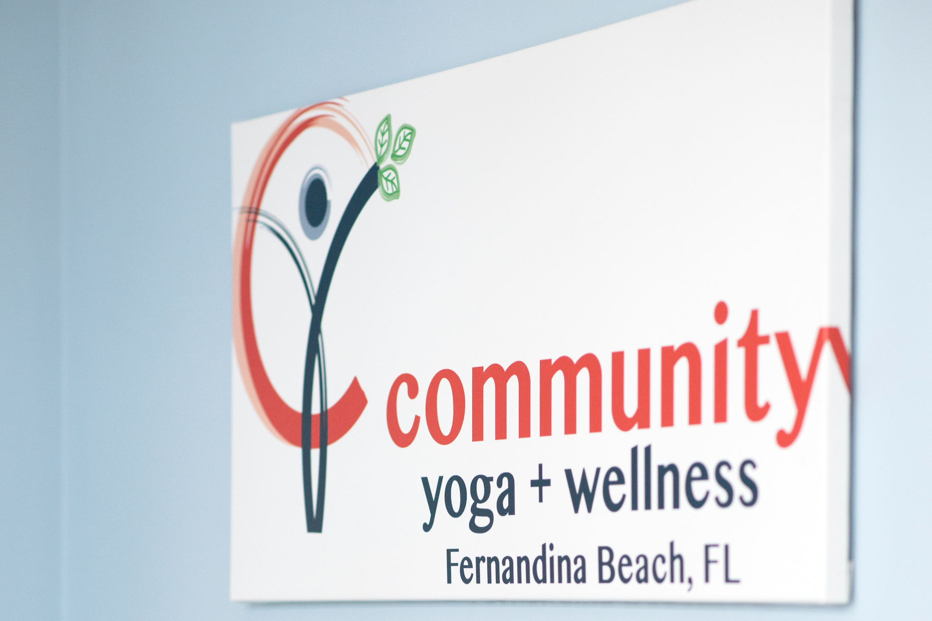 Community Yoga + Wellness logo