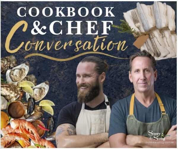 Two male chefs wearing aprons stand in front of a dark blue background decorated with seafood and bundled napkins. Text reads “Cookbook & Chef Conversation,” with the Story & Song Center for Arts & Culture logo in the corner.