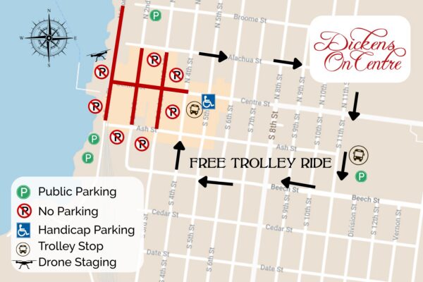 Map showing downtown event layout with public parking, handicap parking, trolley stops, no parking areas, and drone staging. Dickens on Centre and Free Trolley Ride are labeled, with icons indicating key locations.