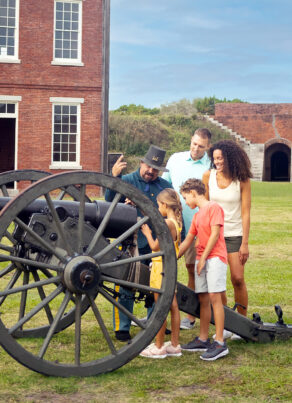 family at Fort Clinch cannon