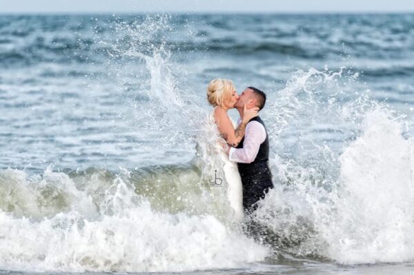 Jensen Bell Photography couple in waves