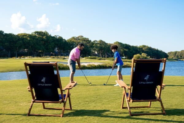 Amelia River Cruises father and son golfing