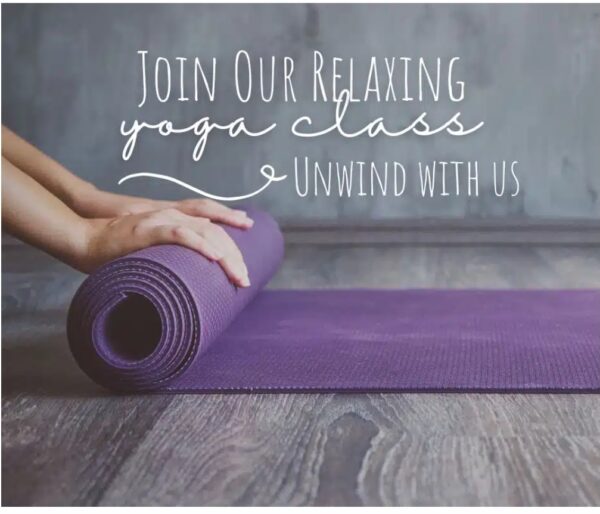 A person’s hands rolling out a purple yoga mat on a wooden floor. Text reads: Join Our Relaxing Yoga Class. Unwind with us. The setting looks calm and inviting.
