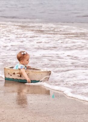 Pam Bell Photography girl in wooden boat