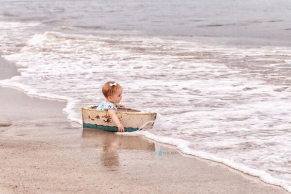 Pam Bell Photography girl in wooden boat