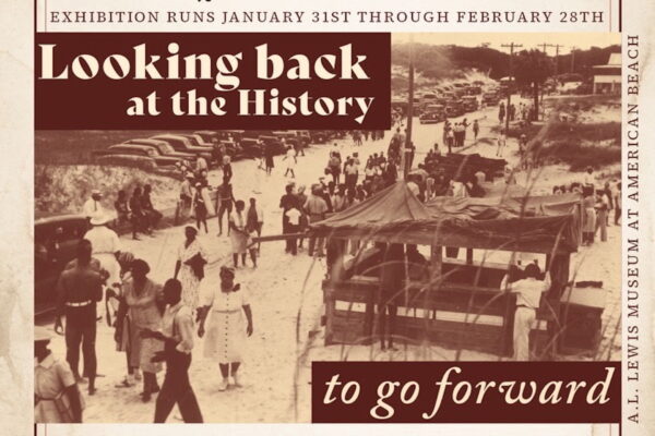 Sepia-toned photo of a busy beach scene with people walking and cars parked. Overlaid text reads: “Looking back at the History to go forward. Exhibition runs January 31st through February 28th. A.L. Lewis Museum at American Beach.”.