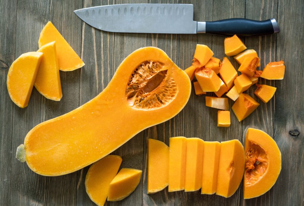 Butternut squash on a rustic wooden surface