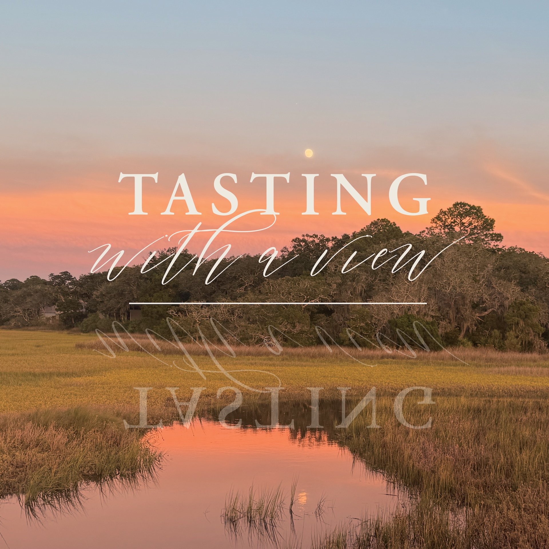 A sunset sky in shades of pink and orange reflects on a calm marsh with tall grasses; text over the image reads, Tasting with a view.