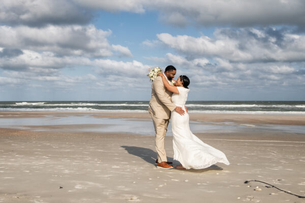 couple posing on beach