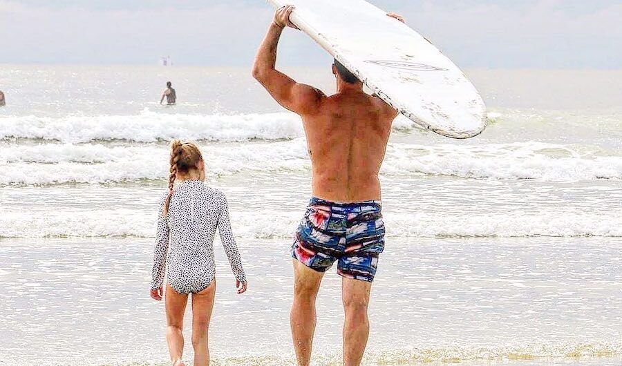 family surfing father daughter