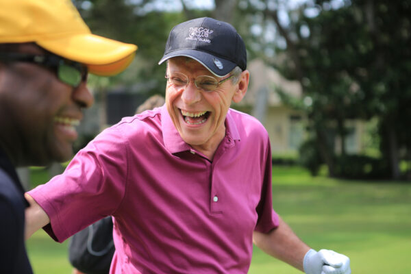 Two men golfing on Amelia Island