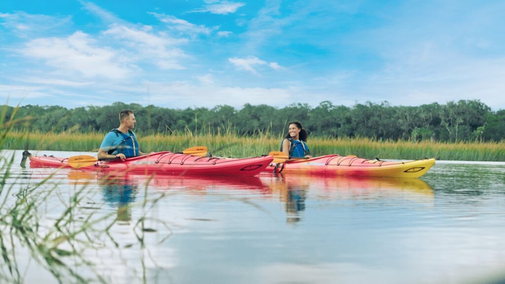kayaking couple on water