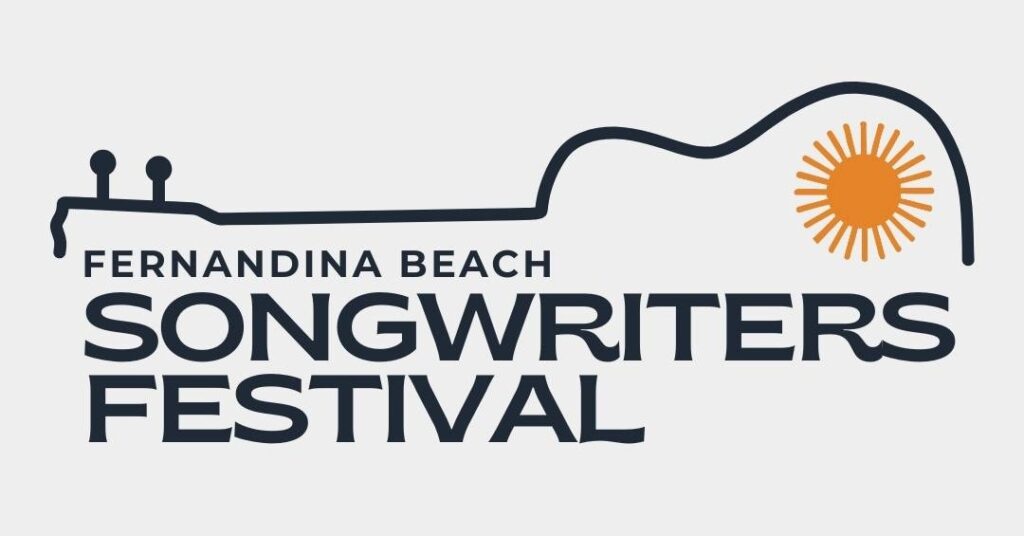 Logo for the Fernandina Beach Songwriters Festival, featuring the festival name below a stylized guitar outline with an orange sunburst representing the guitars sound hole. The background is light gray.