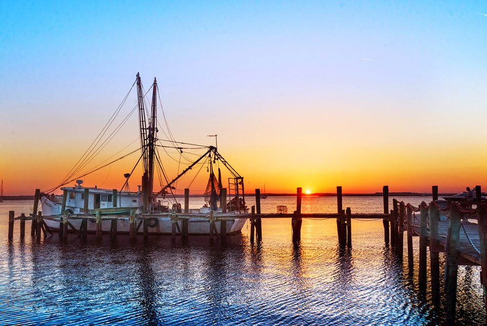 sunset shrimp boat
